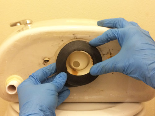 fixing-a-leaky-toilet-installing-new-toilet-tank-gasket-cheapest